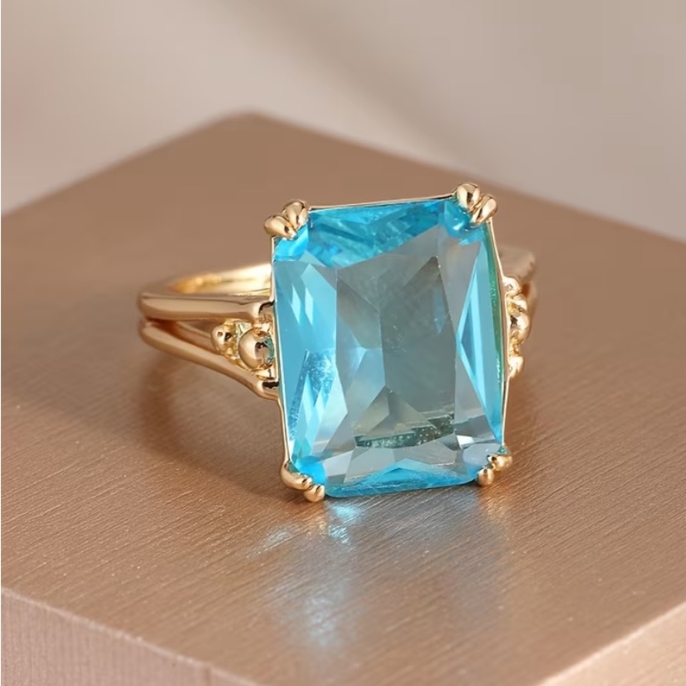 18k Gold Plated Ring with Vibrant Blue Aquamarine Emerald-Cut Stone - Picture 4 of 7